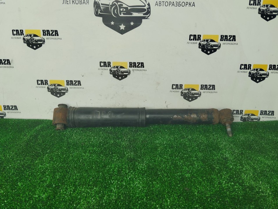  Амортизатор задний левый 