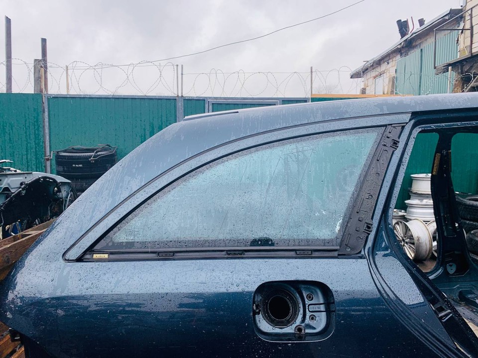  Стекло кузовное заднее правое 