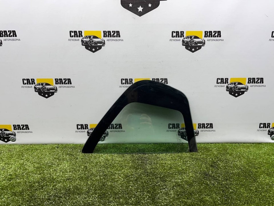  Стекло двери задней левой (форточка) 