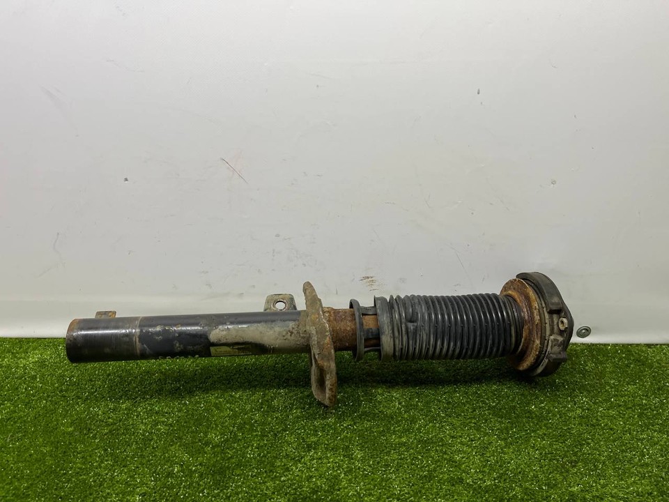  Амортизатор подвески передний левый 