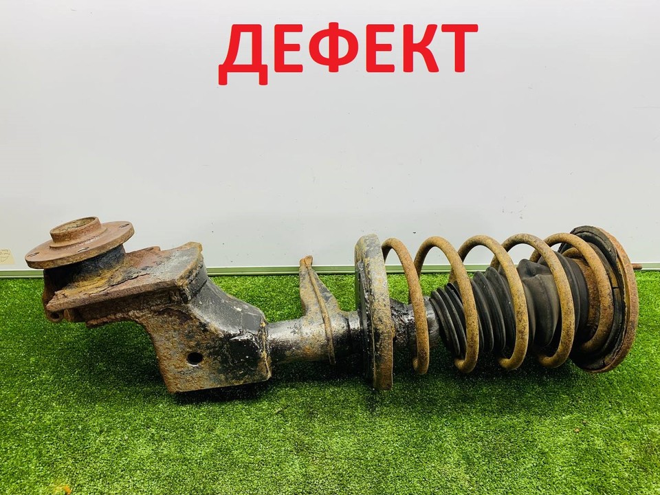  Амортизатор передний левый 