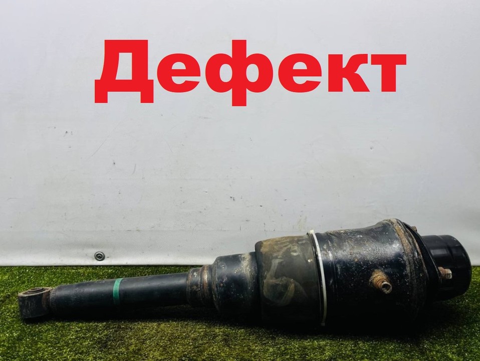  Стойка амортизатора передняя левая 