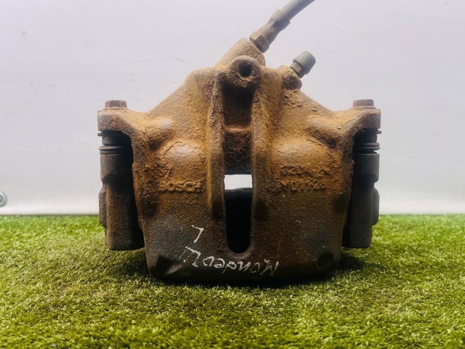  Суппорт передний левый 