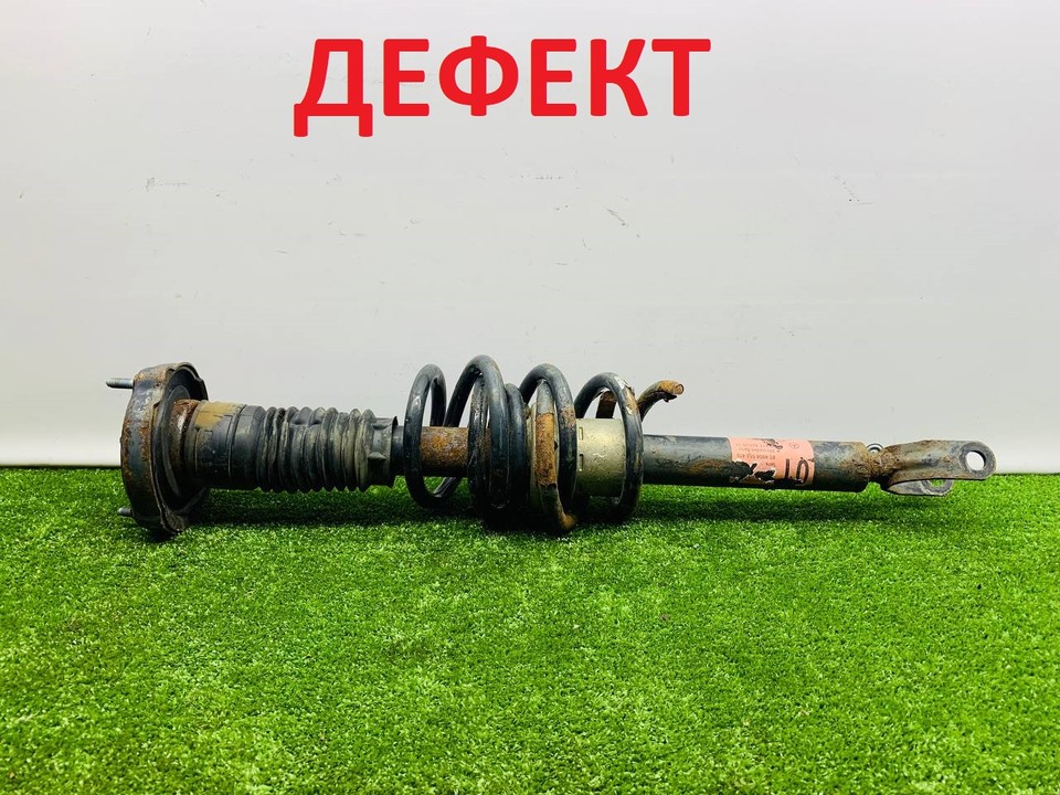  Стойка амортизатора передняя 