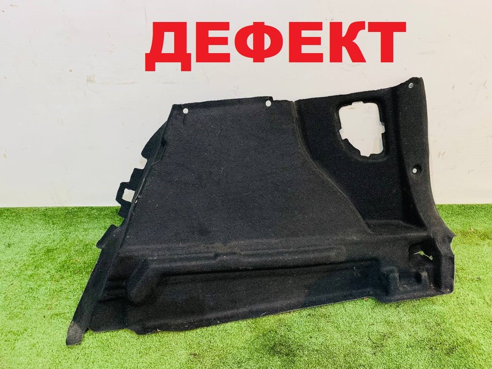  Обшивка багажника правая 