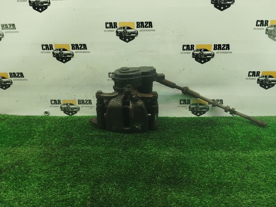  Суппорт задний левый 